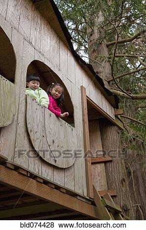 Korean children playing in tree house View Large Photo Image Stock Photo - Korean children playing in tree house. Fotosearch