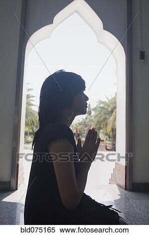 Asian woman praying in temple View Large Photo Image Stock Photography - Asian woman praying in temple. Fotosearch