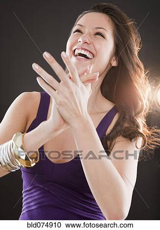 Mixed race woman dancing View Large Photo Image Stock Image - Mixed race woman dancing. Fotosearch