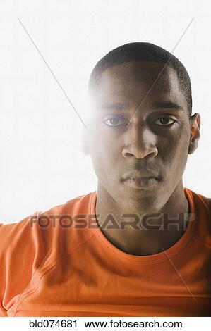 Stock Image - Serious African man. Fotosearch