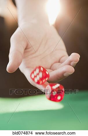 Woman throwing dice View Large Photo Image Picture - Woman throwing dice. Fotosearch