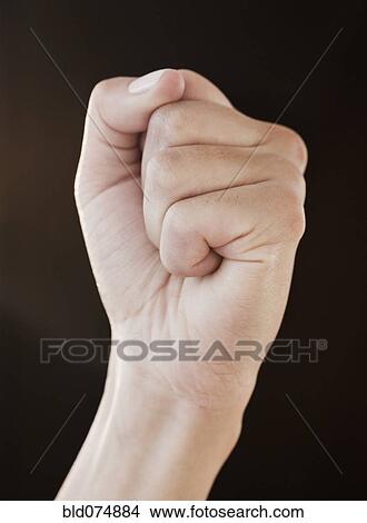 Woman with clenched fist View Large Photo Image Picture - Woman with clenched fist. Fotosearch