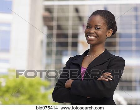 Picture - African businesswoman smiling. Fotosearch