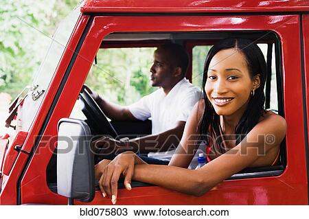 African couple in car View Large Photo Image Stock Image - African couple in car. Fotosearch