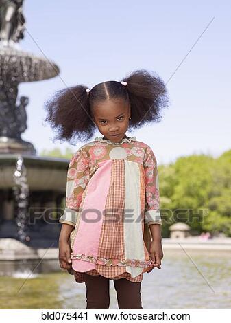 African girl making a face View Large Photo Image Stock Image - African girl making a face. Fotosearch