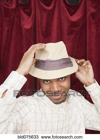 African man in hat acting cool View Large Photo Image Stock Image - African man in hat acting cool. Fotosearch