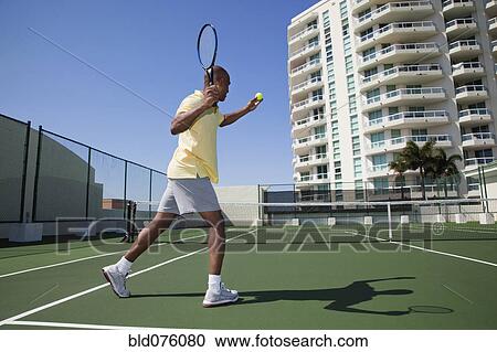 African man playing tennis View Large Photo Image Stock Image - African man playing tennis. Fotosearch