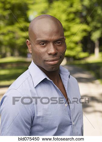 African man smirking View Large Photo Image Stock Image - African man smirking. Fotosearch