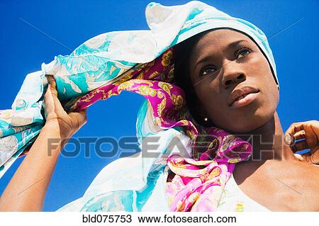 African woman wearing headscarf View Large Photo Image Stock Image - African woman wearing headscarf. Fotosearch