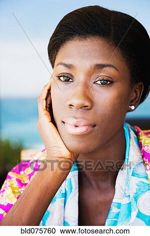 African woman with head in hands View Large Photo Image Stock Image - African woman with head in hands. Fotosearch