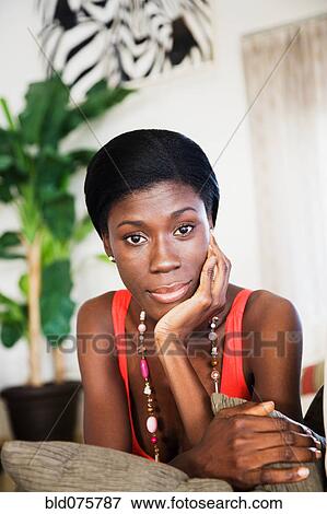 African woman with head in hands View Large Photo Image Stock Photo - African woman with head in hands. Fotosearch