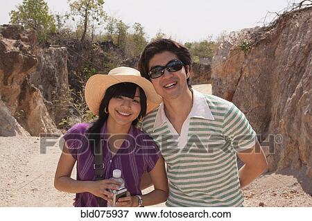 Chinese couple smiling View Large Photo Image Stock Photo - Chinese couple smiling. Fotosearch