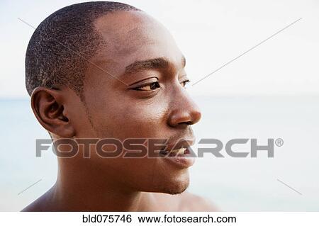 Close up of African man View Large Photo Image Stock Photograph - Close up of African man. Fotosearch