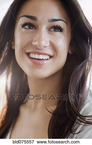 Close up of Hispanic woman smiling View Large Photo Image Stock Photo - Close up of Hispanic woman smiling. Fotosearch