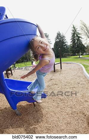 Mixed race girl at playground View Large Photo Image Stock Image - Mixed race girl at playground. Fotosearch