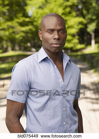 Stock Photo - Serious African man. Fotosearch