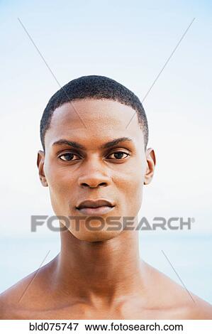 Stock Photo - Serious African man. Fotosearch