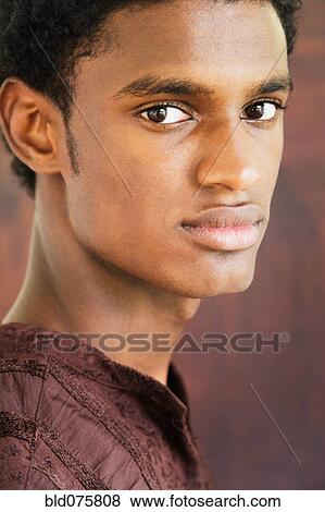 Stock Photo - Serious African man. Fotosearch