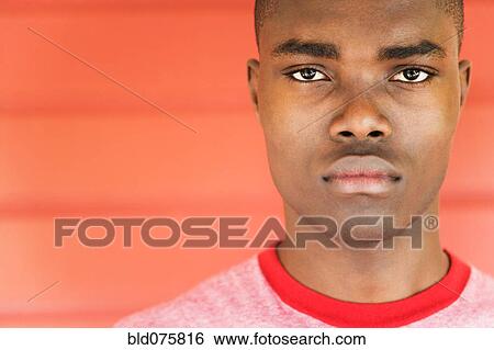 Stock Photograph - Serious African man. Fotosearch