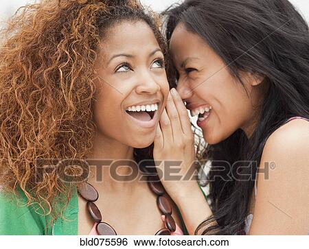 Stock Photograph - Women gossiping. Fotosearch