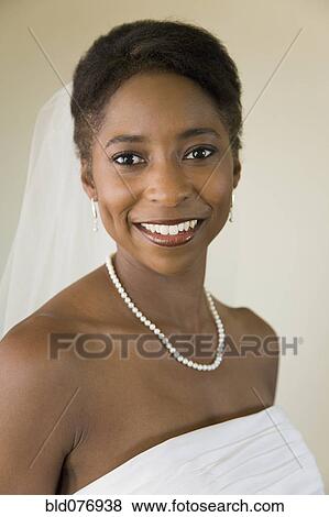 Stock Photo - African bride smiling. Fotosearch