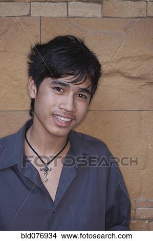 Picture - Asian man smiling. Fotosearch