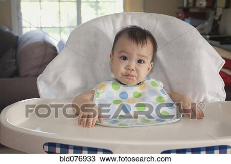 Chinese baby in high chair View Large Photo Image Stock Image - Chinese baby in high chair. Fotosearch