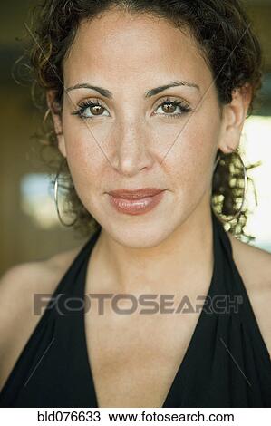 Stock Image - Confident Hispanic woman. Fotosearch