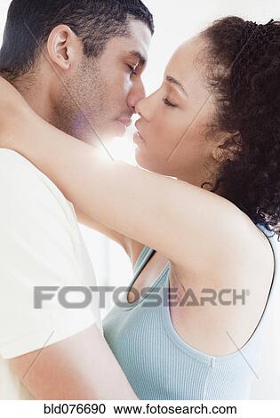 Couple kissing passionately View Large Photo Image Stock Image - Couple kissing passionately. Fotosearch
