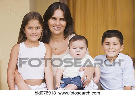 Stock Image - Hispanic woman and children. Fotosearch