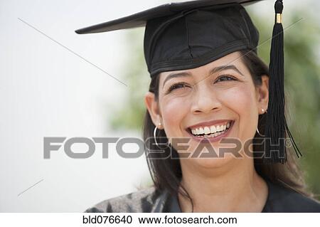 Stock Image - Smiling Hispanic graduate. Fotosearch