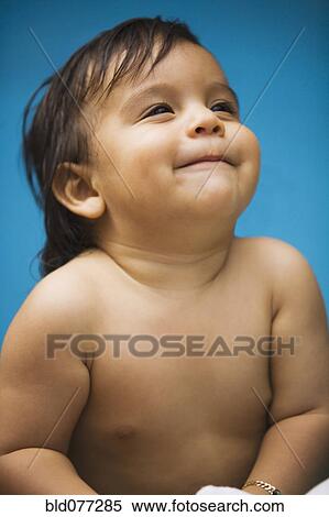 Close up of smiling Hispanic baby boy View Large Photo Image Stock Photography - Close up of smiling Hispanic baby boy. Fotosearch
