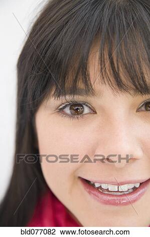 Close up of smiling Hispanic woman View Large Photo Image Stock Image - Close up of smiling Hispanic woman. Fotosearch