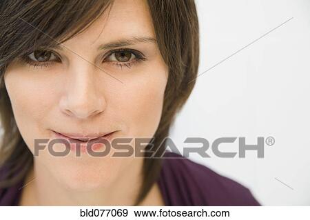 Stock Photo - Hispanic woman smiling. Fotosearch