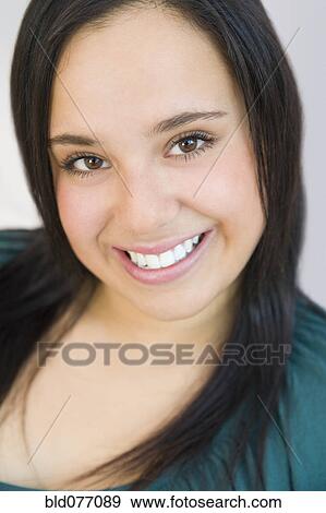 Hispanic woman smiling View Large Photo Image Stock Photo - Hispanic woman smiling. Fotosearch