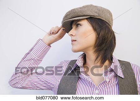 Hispanic woman wearing old-fashioned cap View Large Photo Image Stock Image - Hispanic woman wearing old-fashioned cap. Fotosearch