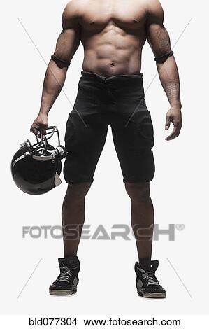 Low section of bare chested football player View Large Photo Image Picture - Low section of bare chested football player. Fotosearch