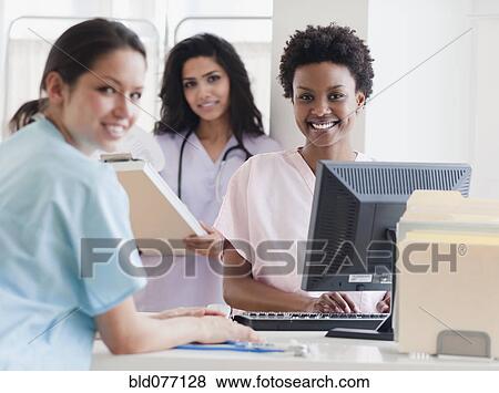 Nurses working in hospital View Large Photo Image Stock Photo - Nurses working in hospital. Fotosearch