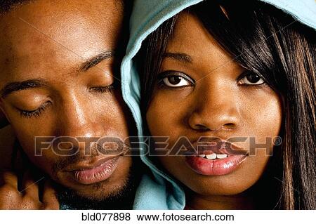 Stock Photo - African couple hugging. Fotosearch