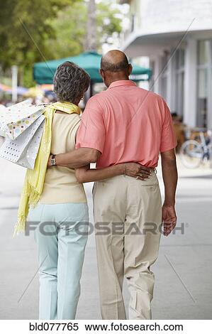 Stock Photography - African couple shopping. Fotosearch