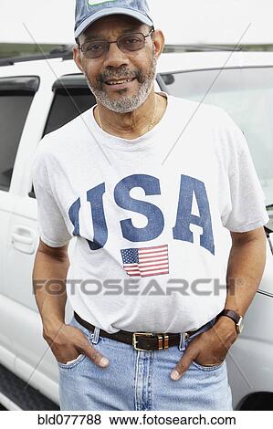 African man with USA t-shirt View Large Photo Image Stock Photo - African man with USA t-shirt. Fotosearch
