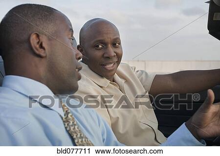 African men talking in convertible View Large Photo Image Stock Image - African men talking in convertible. Fotosearch