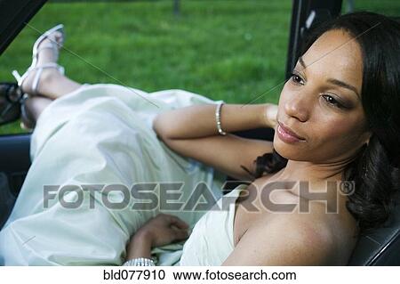 Bride in car with feet out window View Large Photo Image Stock Image - Bride in car with feet out window. Fotosearch