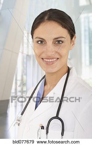 Stock Photo - Mixed race doctor in hospital. Fotosearch