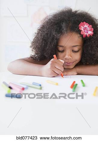 Mixed race girl drawing with crayons View Large Photo Image Stock Image - Mixed race girl drawing with crayons. Fotosearch