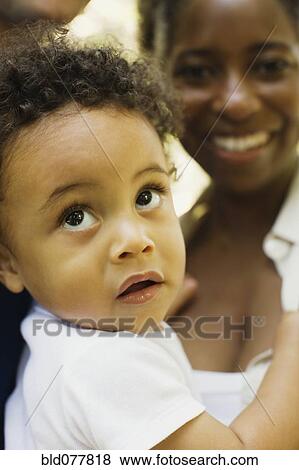 Multi-ethnic family bonding View Large Photo Image Stock Photo - Multi-ethnic family bonding. Fotosearch