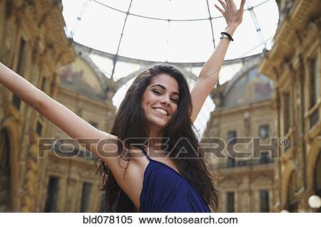 Brazilian woman standing in plaza View Large Photo Image Stock Photography - Brazilian woman standing in plaza. Fotosearch