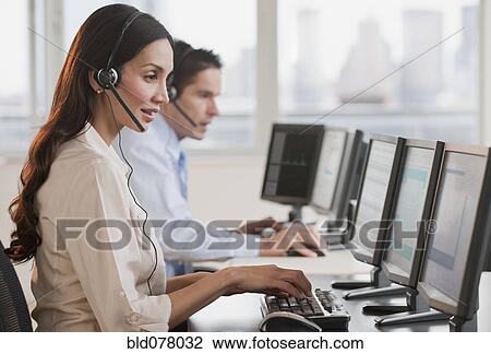 Hispanic businesswoman working on computer View Large Photo Image Stock Image - Hispanic businesswoman working on computer. Fotosearch