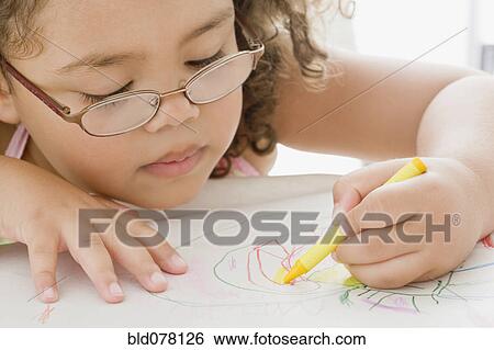 Hispanic girl coloring with crayon View Large Photo Image Stock Photograph - Hispanic girl coloring with crayon. Fotosearch