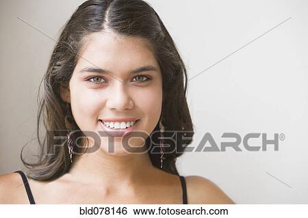 Hispanic woman smiling View Large Photo Image Stock Photograph - Hispanic woman smiling. Fotosearch